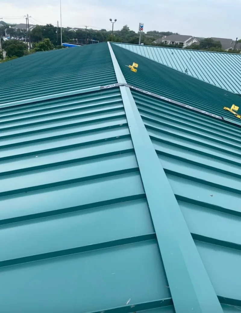 Green commercial metal roof ridge and valley for Metal Roof Repair in Phelan