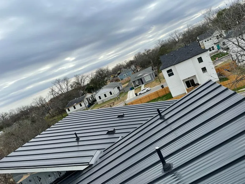 Standing seam metal roof panels with vents for Skylight Repair in Phelan
